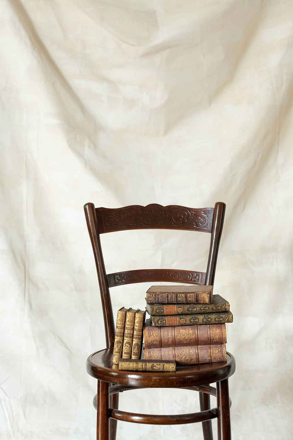 Old chair with old books
